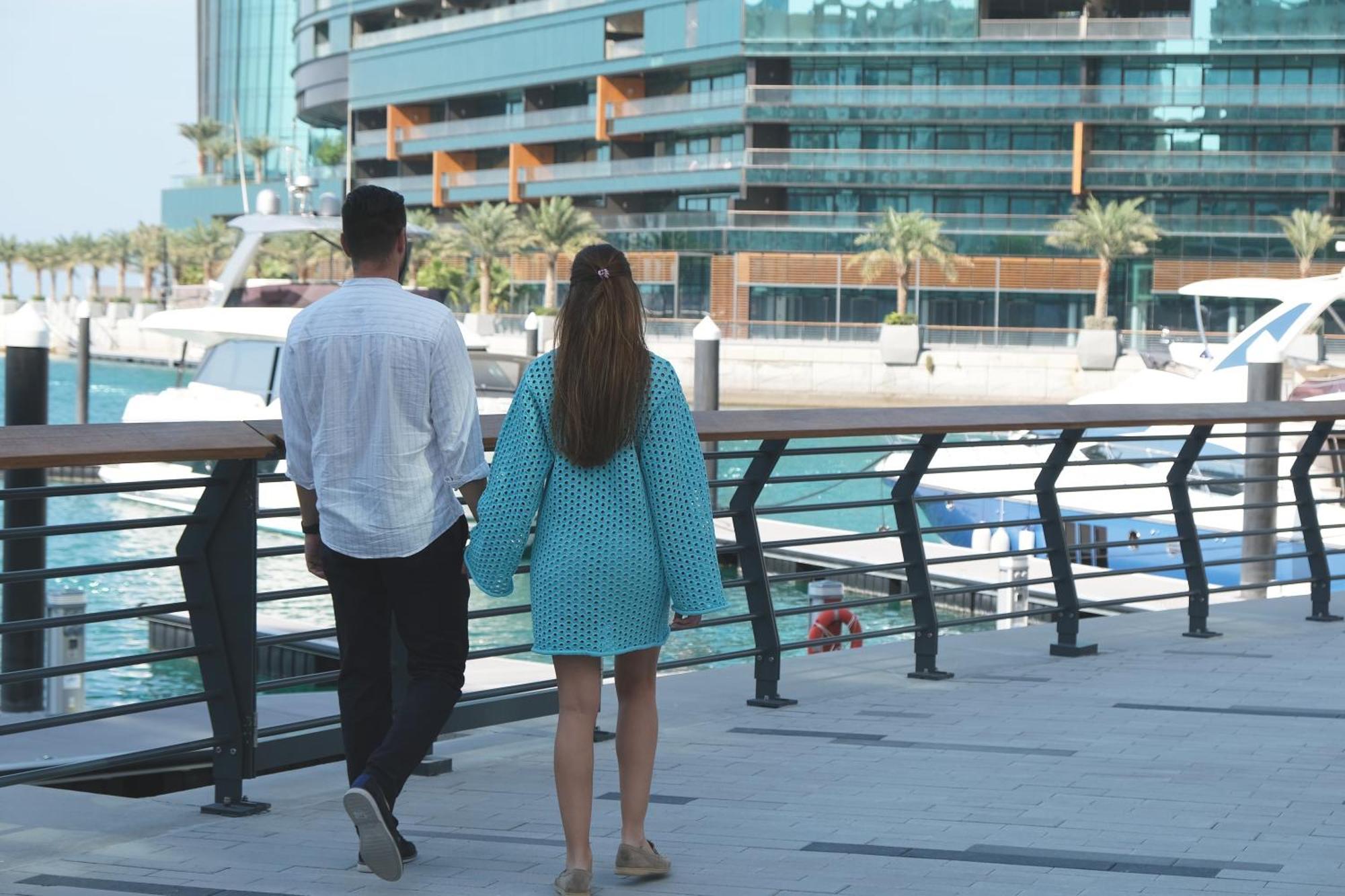 Charthouse Bahrain Hotel Manama Exterior photo A couple walking in Dubai Marina